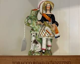 P103 - $40. Stafforshire Spill Vase. Man with dog. 
