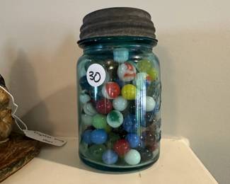 P165 - $30 Antique Blue Ball Jar full of old marbles. 
