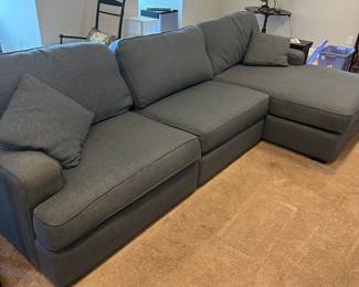 P58 -$1250. La-z boy Paxton Sofa Sectional. Measures 127" wide x 64" deep on chaise side & 41" deep on normal seat x 37" tall. Overall very good condition. Very comfortable!