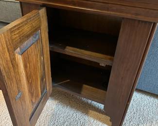 P47 - $25. Small Wooden Storage Cabinet.  Measures 22" wide x 12.5" deep x 25" tall