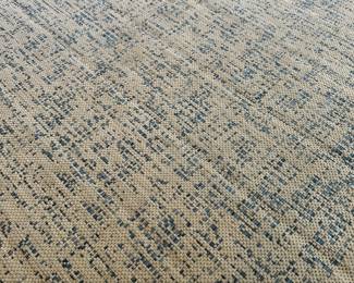 P35 - $75. Indoor/Outdoor area rug used on screened in porch. Measures 93" wide x 116" long.