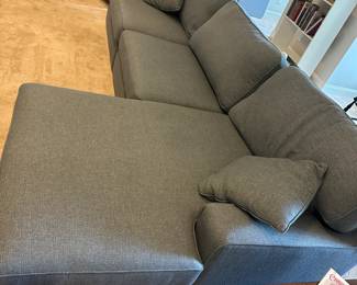 P58 -$1250. La-z boy Paxton Sofa Sectional. Measures 127" wide x 64" deep on chaise side & 41" deep on normal seat x 37" tall. Overall very good condition. Very comfortable!