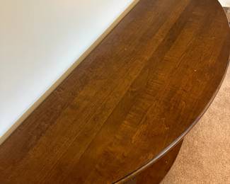 P53 - $75. Demi Lune wood entry or console table.  Measures 52" wide x 18" deep x 30" tall. 