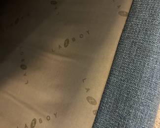 P58 -$1250. La-z boy Paxton Sofa Sectional. Measures 127" wide x 64" deep on chaise side & 41" deep on normal seat x 37" tall. Overall very good condition. Very comfortable!