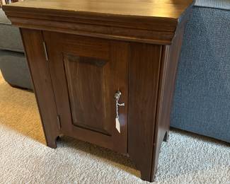P47 - $25. Small Wooden Storage Cabinet.  Measures 22" wide x 12.5" deep x 25" tall