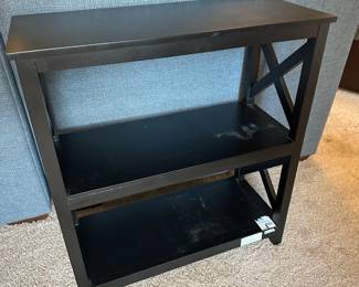 P59 - $20. Single black bookcase. Measures 12" deep  x 26.5 wide x 28.5" tall. 