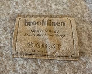P23 - $65. Brooklinen Pure Wool Throw. Made in Germany. Measures 64" wide  x 82" long. 