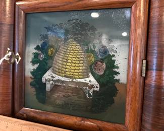 P109 - $100. Terry & Andrews Beehive Clock. Measures 11" wide x 4" deep x 19" tall. Has key and appears to work!