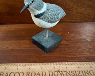 P117 - $20. Carved by Jack T Miller "Snowie Plover"