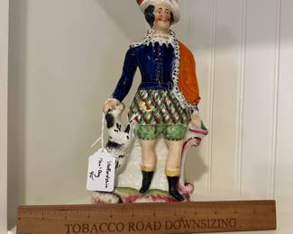 P101 - $40. Staffordshire Statue Man & Dog. 