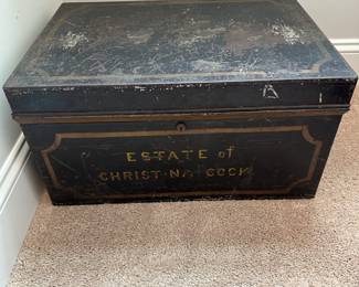 P46 - $75. Large Metal Document Box. Stamped front reads "ESTATE of Christiana Cook". Measures 20.5" wide x 14" deep x 11" tall. No key. 