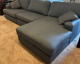 P58 -$1250. La-z boy Paxton Sofa Sectional. Measures 127" wide x 64" deep on chaise side & 41" deep on normal seat x 37" tall. Overall very good condition. Very comfortable!