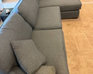 P58 -$1250. La-z boy Paxton Sofa Sectional. Measures 127" wide x 64" deep on chaise side & 41" deep on normal seat x 37" tall. Overall very good condition. Very comfortable!