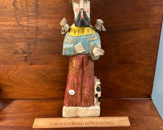 P98 - $30 Carved Wood Saint. 