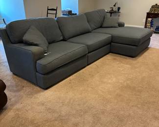 P58 - $1250. La-z boy Paxton Sofa Sectional. Measures 127" wide x 64" deep on chaise side & 41" deep on normal seat x 37" tall. Overall very good condition. Very comfortable!