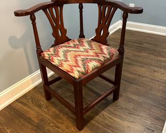 P14 - $75. Corner Chair solid wood frame and easy to reupholster if you wanted to. Measures 30" wide x 24" deep  x 32" tall. 