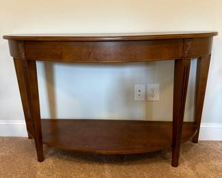 P53 - $75. Demi Lune wood entry or console table.  Measures 52" wide x 18" deep x 30" tall. 