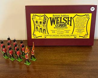 P74 - $35. British Soliders Welsh Guards with Cloth Flags. 
