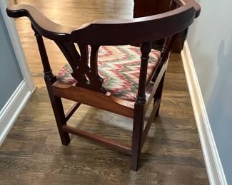 P14 - $75. Corner Chair solid wood frame and easy to reupholster if you wanted to. Measures 30" wide x 24" deep  x 32" tall. 