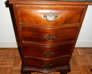 mahogany claw foot serpentine chest