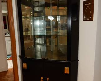 Corner cabinet,  glass front ebony lacquered display case