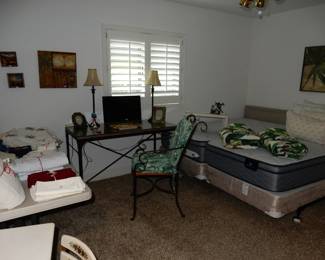 Twin beds, glasstop desk / table