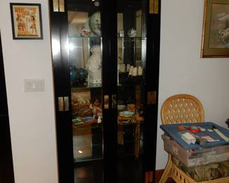 Tall glass front ebony lacquered display case