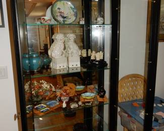 Tall glass front ebony lacquered display case