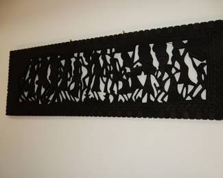 Black painted wood carving