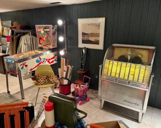 Vintage 1958 Wurlitzer Console Jukebox, model 2200. 1974 Gottlieb's Sky Jump pinball machine. Originally from a bar on campus!