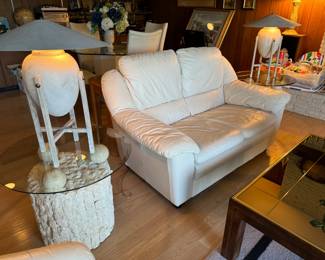 Max Blumberg urn lamp, postmodern tessellated mactan stone end tables. There are two! Each  is 26x21.5". Italian white leather sofa.  Vintage Henredon smokey mirrored coffee table 