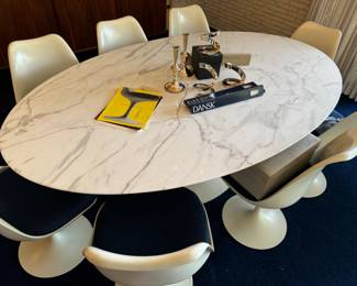 1960s Knoll white marble dining table is 78.5x48x28" with eight chairs. In fantastic  condition!