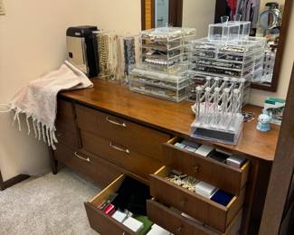 The jewelry collection from here is unreal! We're still working on organizing it,  but I made sure to take a picture of the collection stored in this dresser before we took it all out to sort and price. I took the photo to show the sheer volume of the collection. The entire dresser was filled!