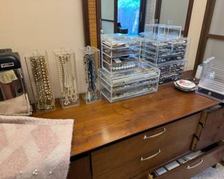 The jewelry collection from here is unreal! We're still working on organizing it,  but I made sure to take a picture of the collection stored in this dresser before we took it all out to sort and price. I took the photo to show the sheer volume of the collection. The entire dresser was filled!
