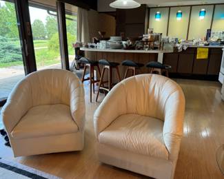 Italian leather swivel barrel chairs. Packed kitchen!