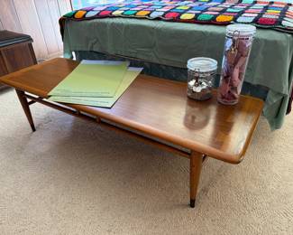 Lane mid-century coffee table is 56x19x14"