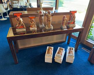 Home is filled with Chief Illini decor, including 9 decanters