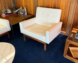 1960s original Knoll, white upholstered (crunchy) club chair with walnut legs.