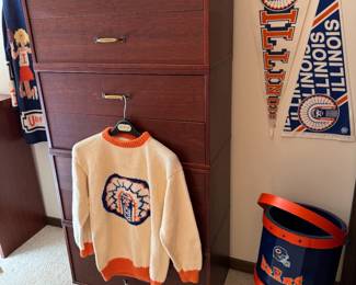 Very nice, newer, stacking drawers. Very unique Chief Illini clothing pieces! We acknowledge as a company the sensitivity around selling vintage Chief Illiniwek items, and do not intend to offend anyone by doing so for our client. We plan to sell these items with the upmost respect and dignity for what they represent and deserve. 
