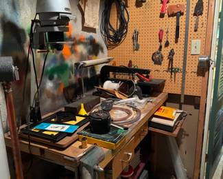 Secret darkroom in basement has a vintage Bogen enlarger, everything you need at-home darkroom set-up for 35mm