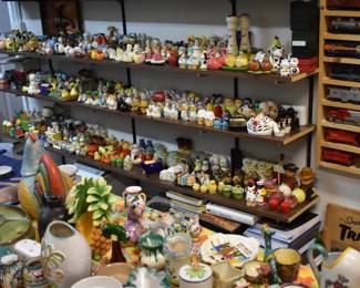 Shelves of shakers. top shelf Japan lower shelves mixed. 