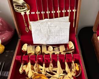 Gold colored flatware 