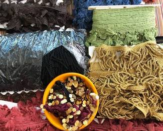 Trim s on bolts plus some by lengths, roll bolts of fabric un pictured.