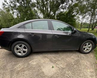 2015 Chevy Cruise LT
AC
243,000 miles 
