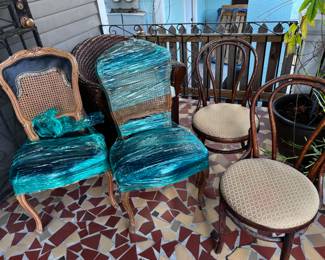 Cane & leather chair set.