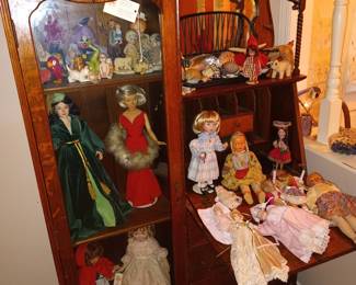 Dolls in Oak display cabinet and desk