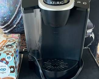 Keurig coffee machine, included coffee pods and pod holding tray 