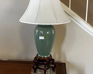 Green crackled lamp with white shade and stand