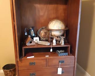 Primary bedroom, entertainment cabinet, globe, etc.