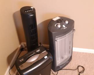 Primary bedroom, instruments that convert matter.  Front left machine turns sheets of paper into thin strips and conceals information printed on said sheet of paper.  The other two machines convert air, but I don't have time to tell you about that now.